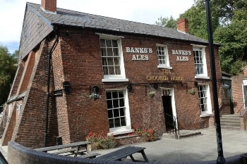 Police treating Crooked House pub fire as arson image